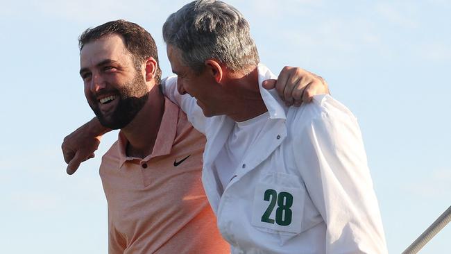 Scottie Scheffler and caddie Ted Scott celebrate on the 18th green after winning the 2024 Masters Tournament at Augusta National Golf Club. Picture: Warren Little/Getty Images/AFP