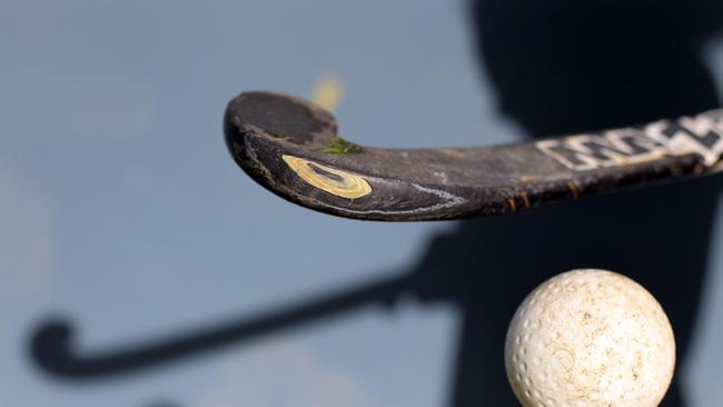 Generic shots of hockey ball and stick