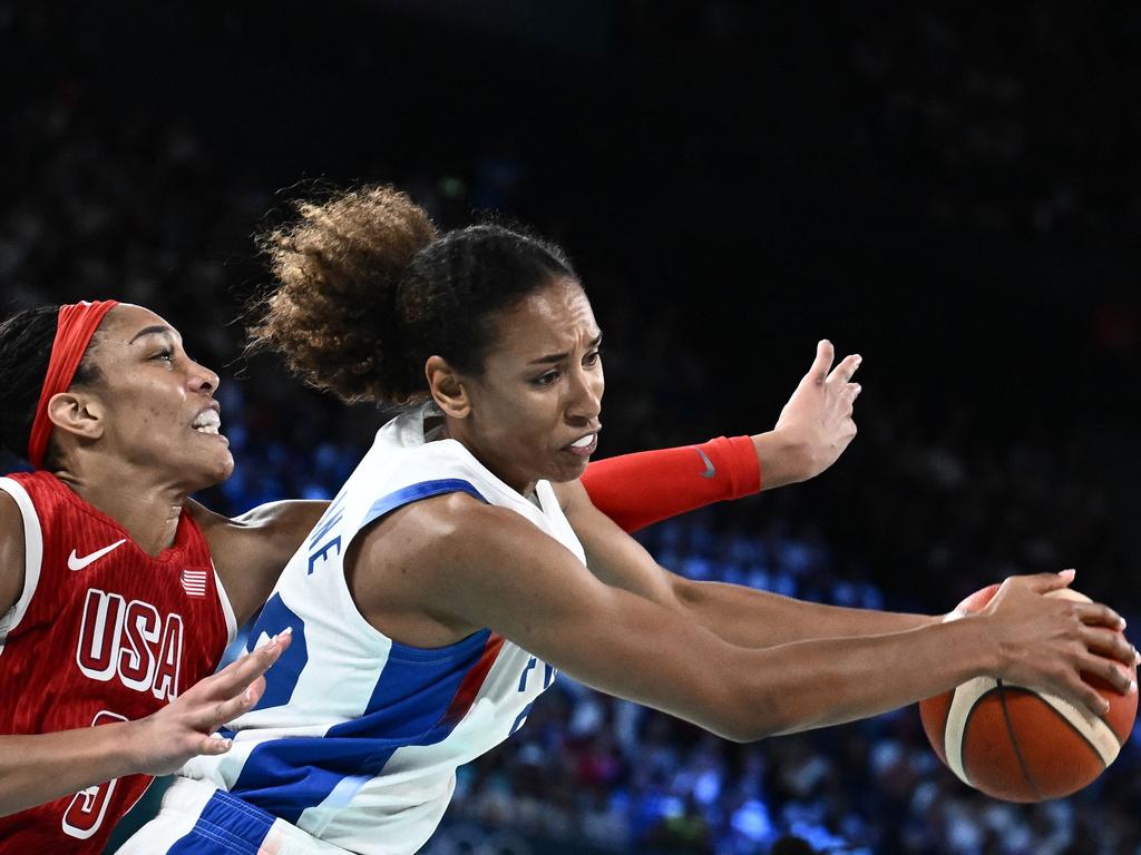 USA's #09 A'ja Wilson, left defends against France's #22 Marieme Badiane in the women's gold medal match on August 11. Picture: Aris Messinis/AFP