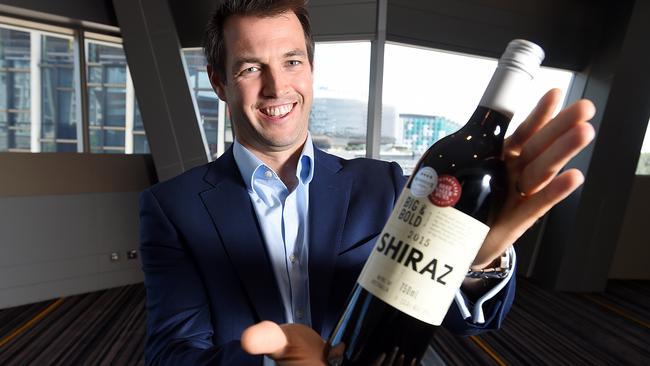Ed Ashley, head of wine sourcing for Coles’ Liquorland stores, with own-label Big &amp; Bold shiraz. Picture: Sam Wundke
