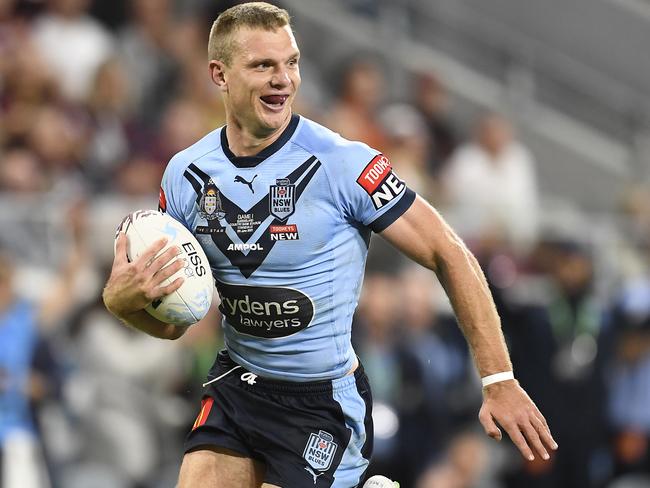 Tom Trbojevic was outstanding for the Blues in Game 1 in Townsville with three tries. Picture: Ian Hitchcock/Getty Images.