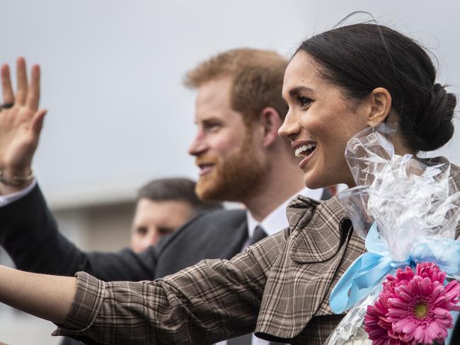 Prince Harry, Duke of Sussex and Meghan Markle, Duchess of Sussex, greet the crowd at Pukeahu National War Memorial Park in Wellington. Picture: AAP