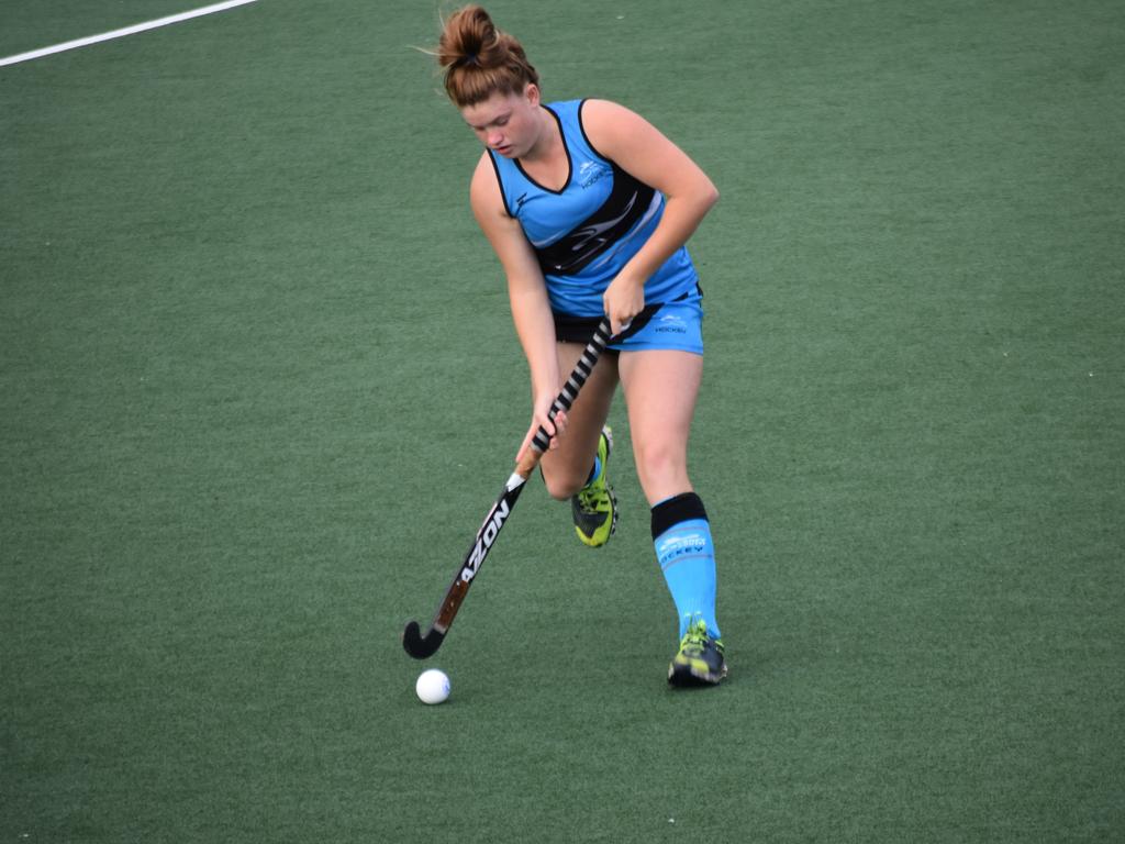 A Sydney South player shoots the ball at NSW U18s Girls Hockey Championships, May 21.