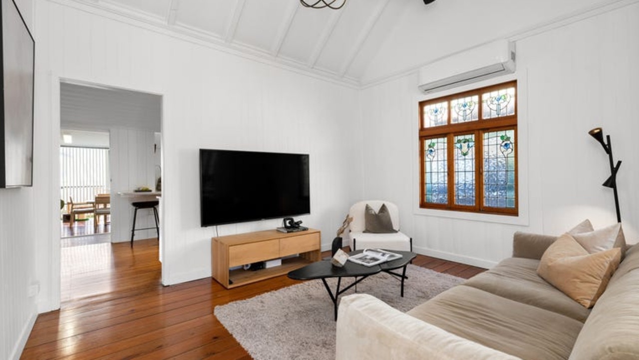 Original timber floors and stained glass windows were restored