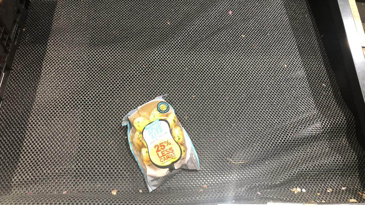 A lone potato packet sits sadly in Woolies. Picture: Alex Turner-Cohen/news.com.au