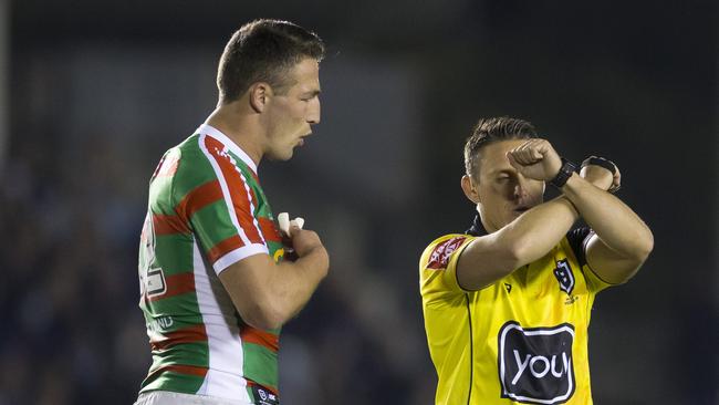 Sam Burgess of the Rabbitohs is put on report for the shot on Matt Moylan. Picture: AAP Image/Craig Golding