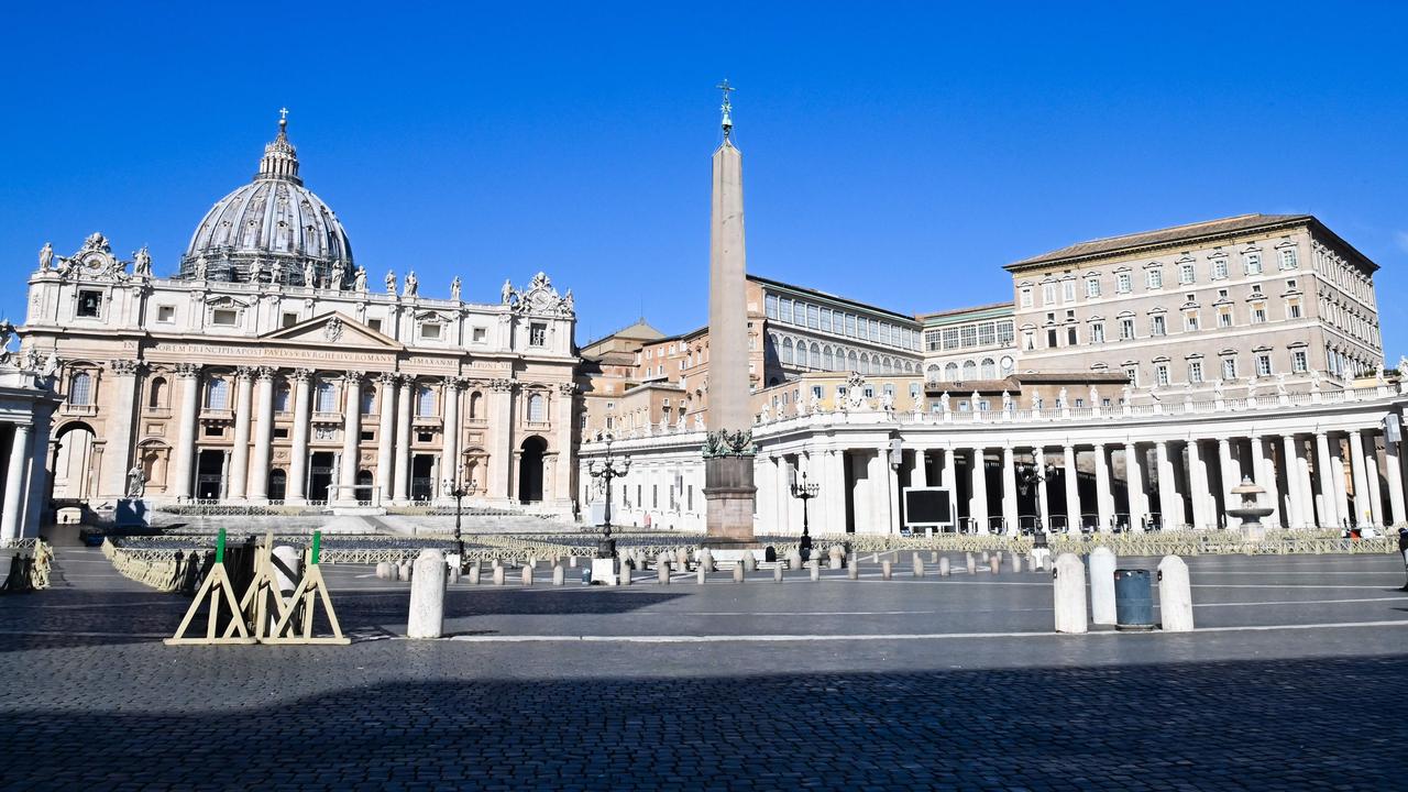 The Vatican's Saint Peter's Square and its main basilica on March 11, a day after they were closed to tourists as part of a broader clampdown aimed at curbing the coronavirus outbreak. Picture: Andreas Solaro/AFP.