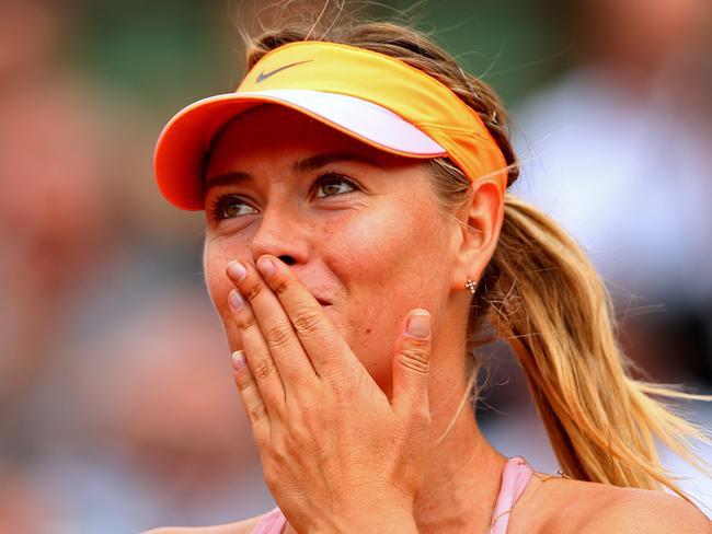 PARIS, FRANCE - JUNE 03: Maria Sharapova of Russia celebrates victory during her women's singles match against Garbine Muguruza of Spain on day ten of the French Open at Roland Garros on June 3, 2014 in Paris, France. (Photo by Clive Brunskill/Getty Images)