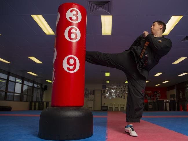 Di Carn poses for photographs at Irontiger Taekwondo, in Castle Hill on Monday the 27th of August,2018.Di Carn is a well-regarded taekwondo instructor and has been nominated for a Local Sports Star award.(AAP Image/ Justin Sanson)