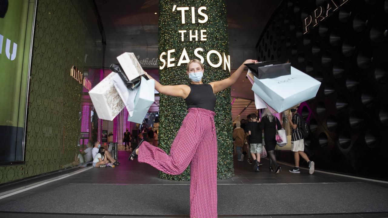 Paige Oliver celebrates outside Westfield in the Sydney CBD after some Boxing Day shopping. Picture: Monique Harmer