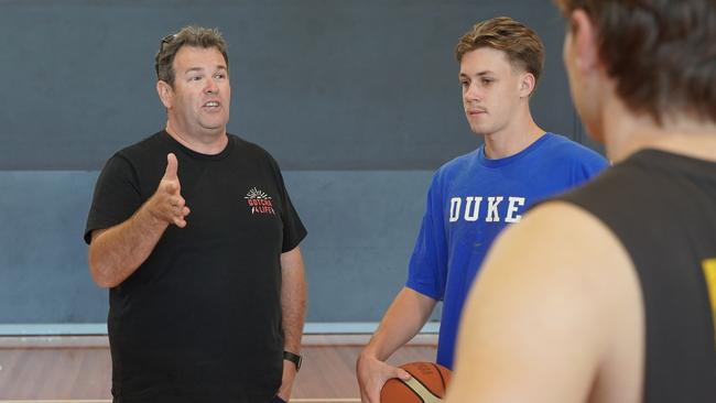 The founder of Gotcha4Life Gus Worland (centre) talking to young basketball players at the Northern Beaches Police Citizens Youth Club at Dee Why, about the importance of being able to speak about your problems. Picture: NSW PCYC