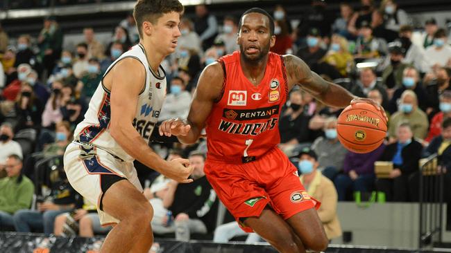 Vic Law drives to the basket during the NBL blitz.