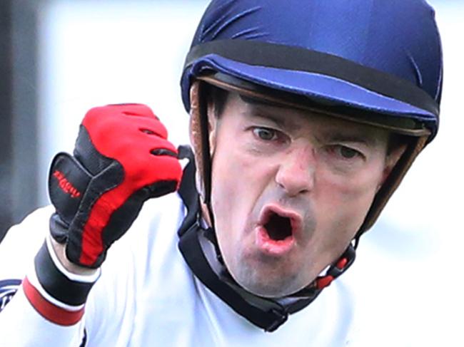Jockey Dean Yendall on Yankee Rose celebrates winning the Moet & Chandon Spring Champion Stakes race during the Moet & Chandon Spring Champion Stakes Day at Randwick Racecourse in Sydney, Saturday, Oct. 8, 2016. (AAP Image/David Moir) NO ARCHIVING, EDITORIAL USE ONLY