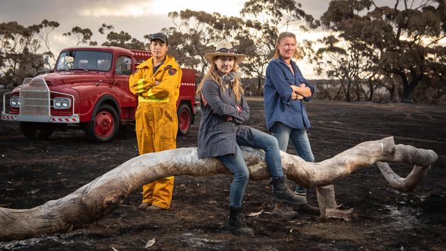 Alex Barwick, Georgina Hannaford and Ro Horbelt all jumped on the back of farm units to help fight the fires. Picture: Brad Fleet