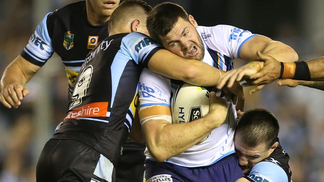 Titan Anthony Don battles against the Sharks defence. Picture: AAP