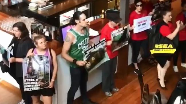 Protesters storm the Rare Steakhouse in Melbourne.