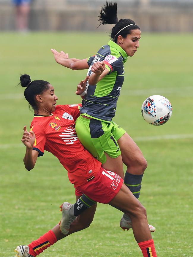 Canberra’s Leena Khamis competes with Adelaide’s Lais Araujo. Picture: Mark Brake/Getty Images