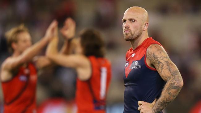 A dejected Nathan Jones after Melbourne suffered a defeat to Essendon. Picture: Michael Dodge/Getty Images.