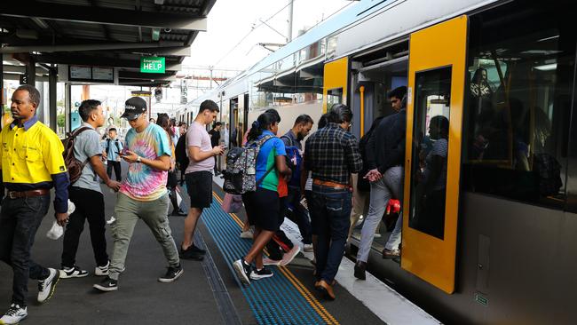 SYDNEY, AUSTRALIA - Newswire photos FEBRUARY 28 2023: A view of commuters at the Auburn Train Station where Police believe a man was involved in the stabbing of a 28-year-old stranger minutes before he threatened officers inside a police station in Sydneyâs west and the Police shot a knife-wielding man dead. NSW Police said the man was shot after making the threats at Auburn Police Station at 12.08am on Tuesday.Picture: NCA Newswire/ Gaye Gerard