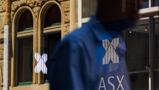 SYDNEY, AUSTRALIA - NewsWire Photos, October 29 2024. GENERIC. Stocks. Finance. Economy. People walk past the Australian Stock Exchange, ASX, on Bridge Street. Picture: NewsWire / Max Mason-Hubers