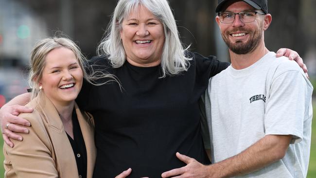 Not long to go now. Lisa Sharp (centre) is carrying her grandchild for daughter Cassidy Sharp and future son-in-law Corey Macartney. Picture: David Caird