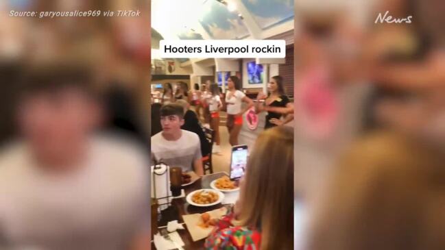 Hooters girls confuse diners by singing in 'American accents'