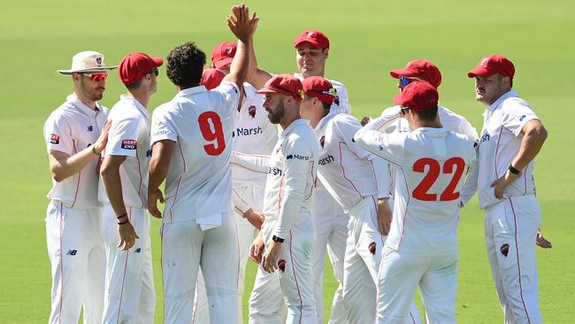 Wes Agar and South Australia celebrate another wicket. Picture: Quinn Rooney/Getty Images