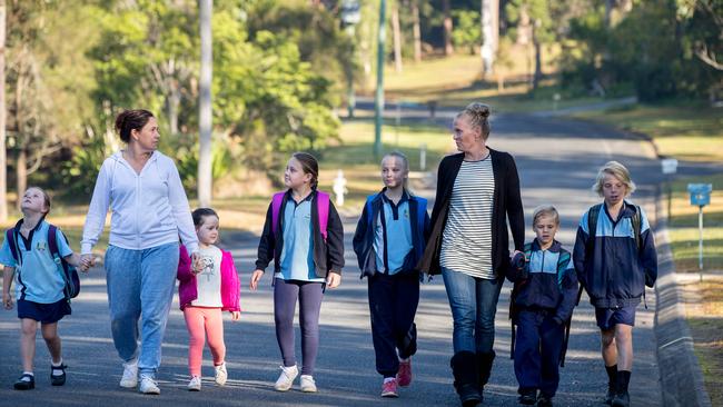 Neighbours Lydene Heslop and Anne-Maree Sharpley (above with their children on Benaroon Drive) helped in the early search for William. Picture: Lindsay Moller