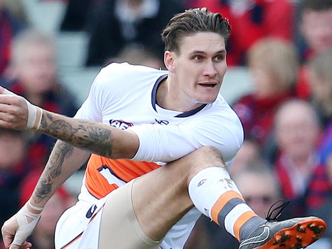 AFL Round 23. 26/08/2018.  Melbourne vs Greater Western Sydney at the MCG.   GWS Giants Rory Lobb kicks the Giants inside 50    . Pic: Michael Klein