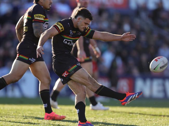 PENRITH, AUSTRALIA - JULY 21: Nathan Cleary of the Panthers kicks the match winning field goal in golden point during the round 20 NRL match between Penrith Panthers and Dolphins at BlueBet Stadium on July 21, 2024 in Penrith, Australia. (Photo by Jason McCawley/Getty Images)