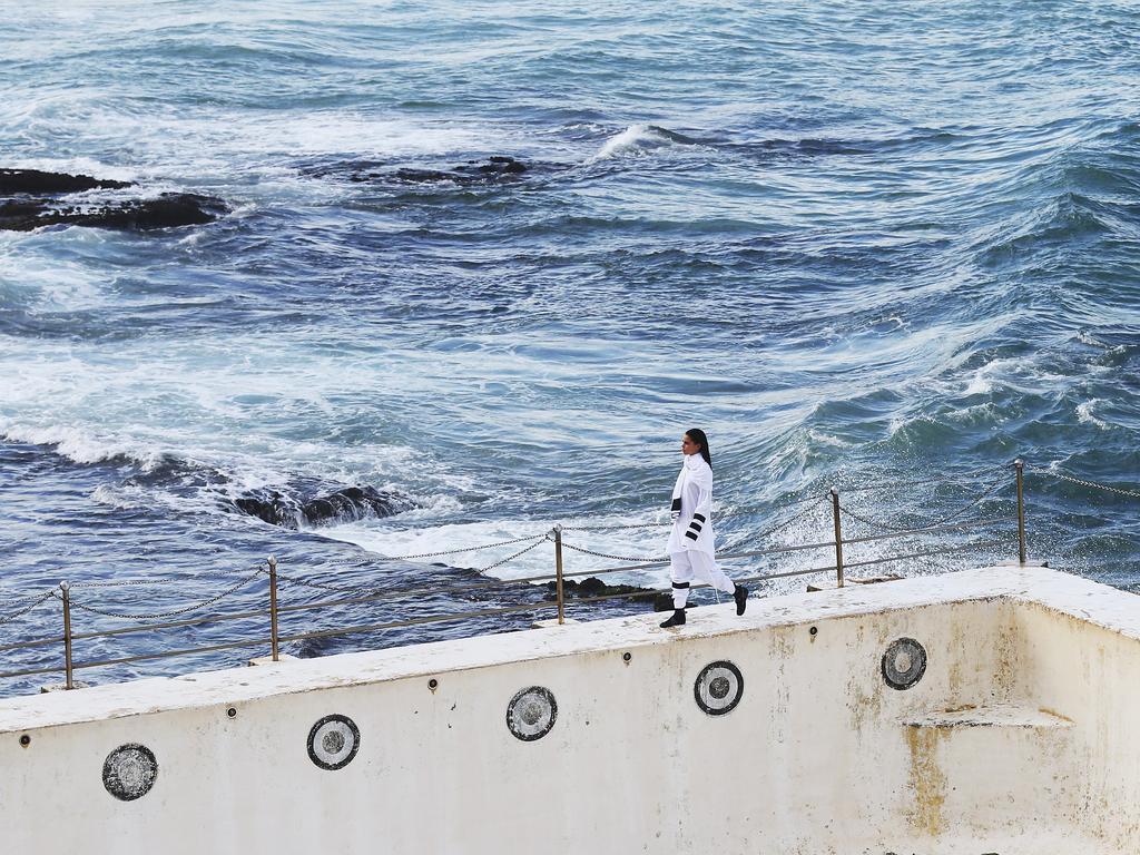 Models showcase designs during the Ten Pieces show at Mercedes-Benz Fashion Week Australia 2015 at Bondi Icebergs. Picture: Getty