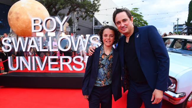 Felix Cameron and Trent Dalton pose for photographs during the Netflix global premiere of Boy Swallows Universe at New Farm Cinemas on January 9 in Brisbane.