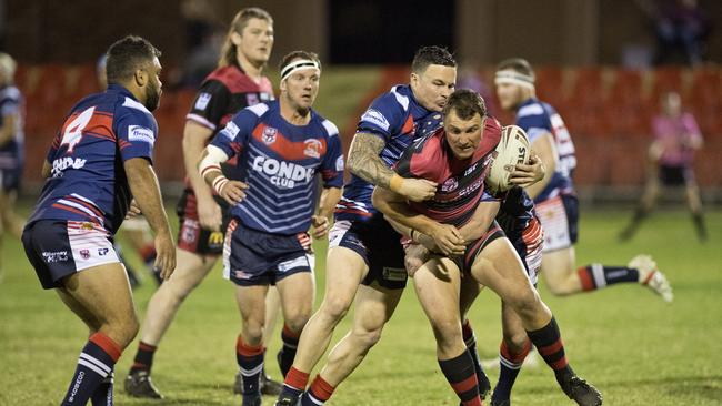 Valley's Aaron Sillitoe is wrapped up by Warwick Cowboys in last year’s TRL major semi-final between Warwick and Valleys.