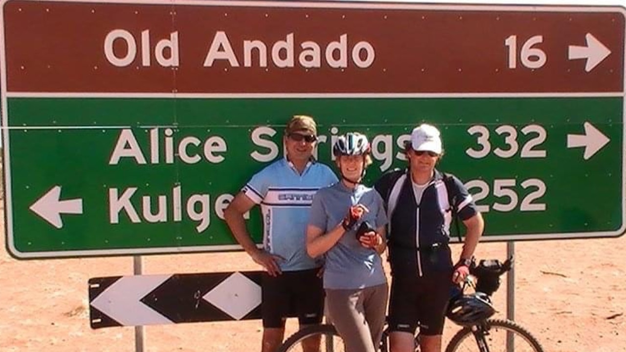 Former Central Queensland barrister Ross Lo Monaco and Supreme Court judge Justice Peter Dutney in the Australian outback on a riding holiday in 2009. The woman in the photo was the other rider, not known to the men prior to the holiday, who rode through the deserts on this trip.