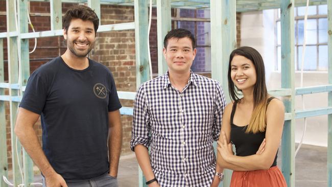 Supplied Editorial Canva board member Wesley Chan (centre) with co-founders Cliff Obrecht and Melanie Perkins. Photo