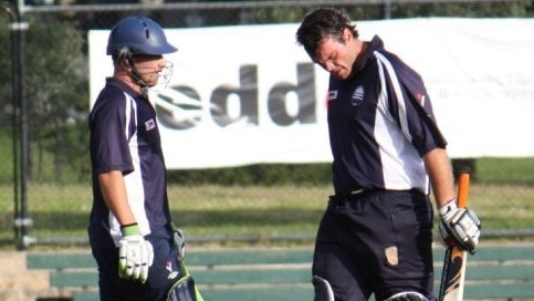 A young Aaron Finch (left) with Damian Shanahan in Geelong colours.