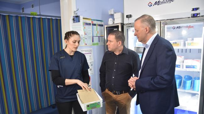 Nurse manager Jessica Craig showing Labor candidate for Flynn Matt Burnett and leader of the opposition Anthony Albanese Covid-19 vaccines