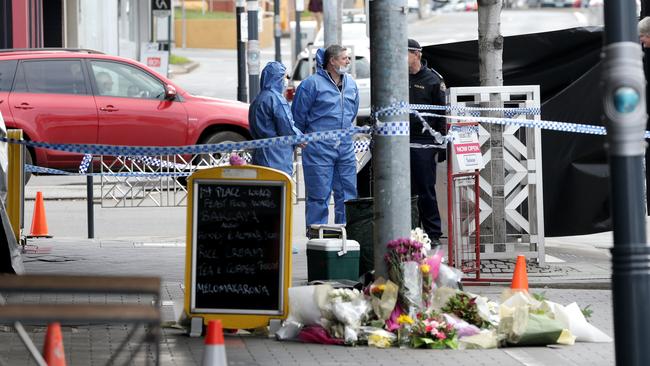 Tasmania Police forensics officers at the scene of Voula Delios’s stabbing murder in 2016.