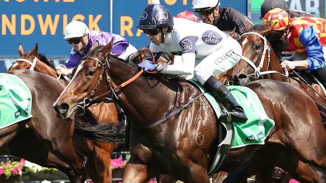 SYDNEY, AUSTRALIA - MARCH 01: Jason Collett riding  Within The Law  win Race 5 TAB Sweet Embrace Stakes during Sydney Racing at Royal Randwick Racecourse on March 01, 2025 in Sydney, Australia. (Photo by Jeremy Ng/Getty Images)