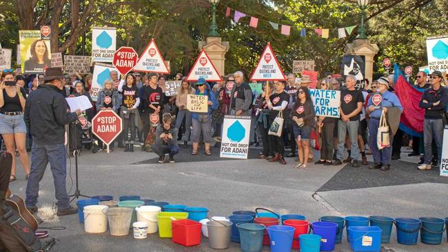 Protesters gathered outside Queensland Parliament calling to 'stop the clock' on approval for Adani's groundwater plan. Picture: HAYLEY TROUPE