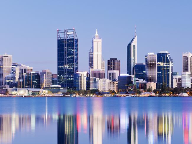 The Perth city skyline at twilight, viewed across the Swan River, Western Australia.