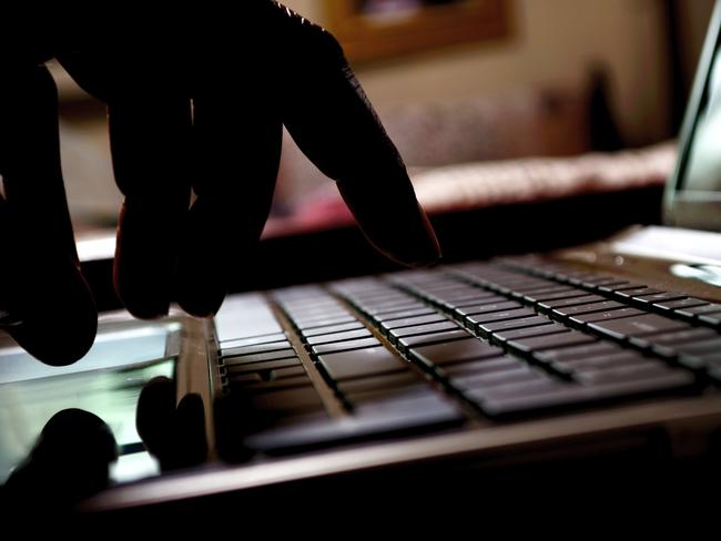 cyber crime hacker typing on laptop Photo: istock