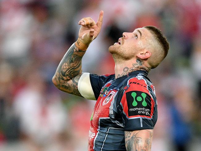 Josh Dugan of the Dragons gestures after scoring a try during the Round 4 NRL match between the St George-Illawarra Dragons and the New Zealand Warriors at UOW Jubilee Oval in Sydney, Sunday, March 26, 2017. (AAP Image/Dan Himbrechts) NO ARCHIVING, EDITORIAL USE ONLY
