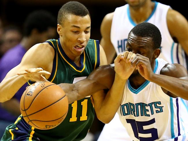 Dante Exum has the ball stolen by Charlotte’s Kemba Walker. Picture: Getty Images.