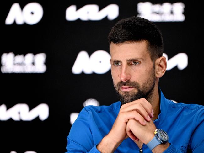 This handout picture released by the Tennis Australia on January 19, 2025 shows Serbia's Novak Djokovic speaks during a press conference at the Australian Open tennis tournament in Melbourne. (Photo by Vince CALIGIURI / TENNIS AUSTRALIA / AFP) / EDITORS NOTE ----RESTRICTED TO EDITORIAL USE MANDATORY CREDIT 