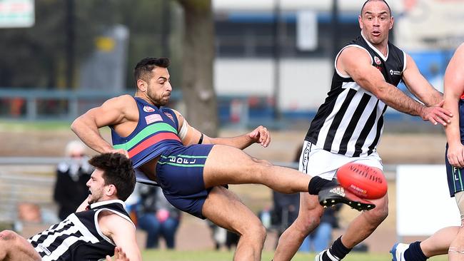 Mohamed Taleb gets a kick away for Northern Saints. Picture: Josie Hayden