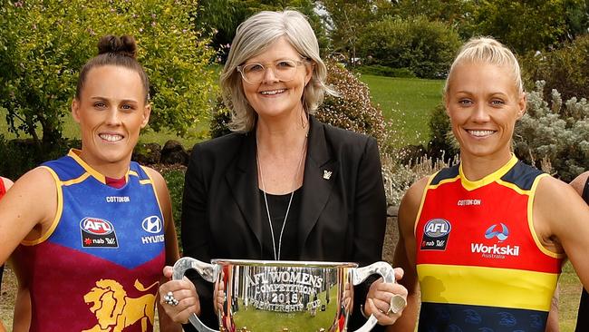 Sam Mostyn with AFLW footballers in 2018. Picture: Michael Willson / AFL Media