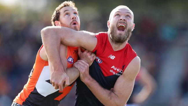 Shane Mumford battles Max Gawn before his retirement.