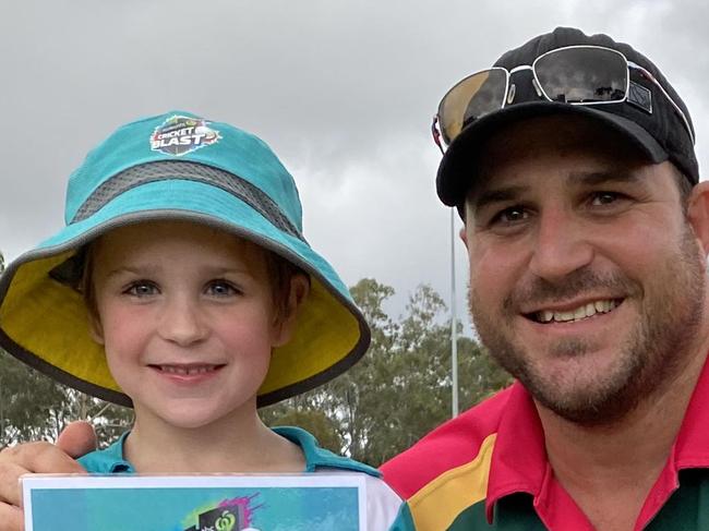 A rugby league, cricket and netball coach from Boyne Island has been named Gladstone’s best sports coach after taking a leap of faith and coaching his son’s team. Pictured with his youngest son, Logan.