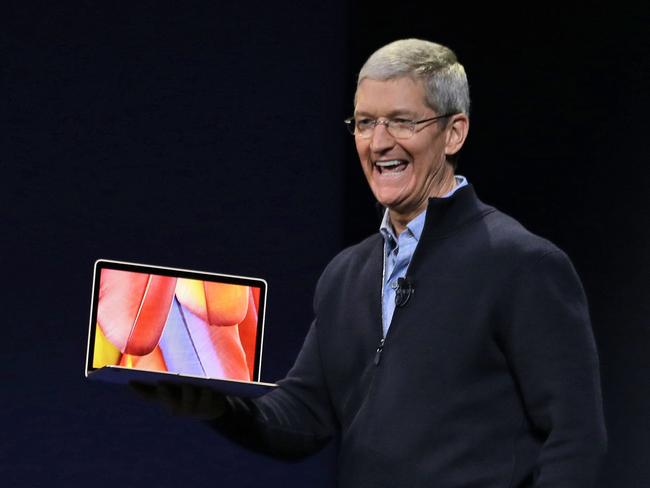 Apple CEO Tim Cook introduces the new Apple MacBook during an Apple event on Monday, March 9, 2015, in San Francisco. (AP Photo/Eric Risberg)